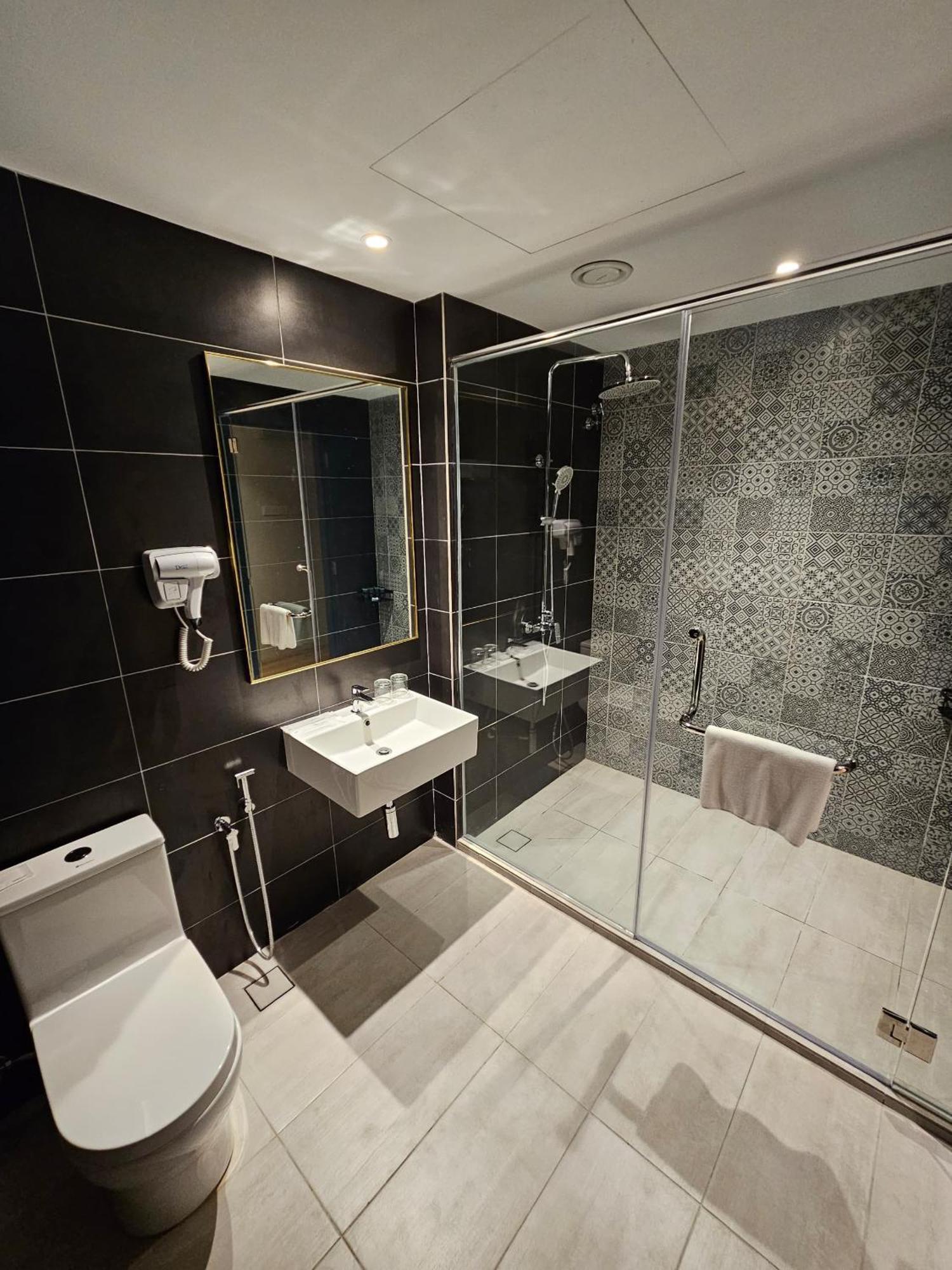 Le'Genda Hotel Каджанг Стая снимка