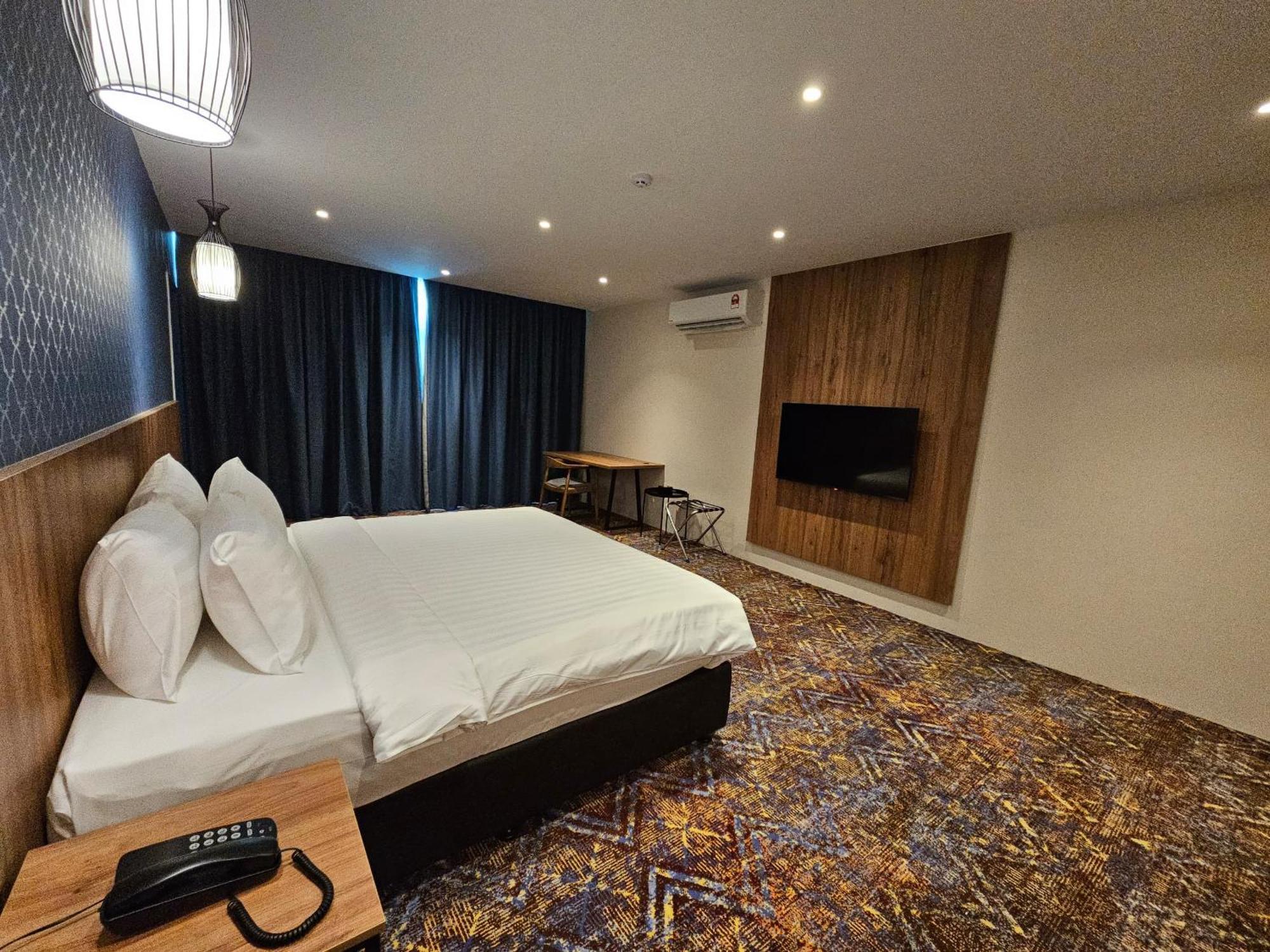 Le'Genda Hotel Каджанг Стая снимка